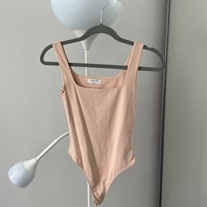babaton rose pink body suit